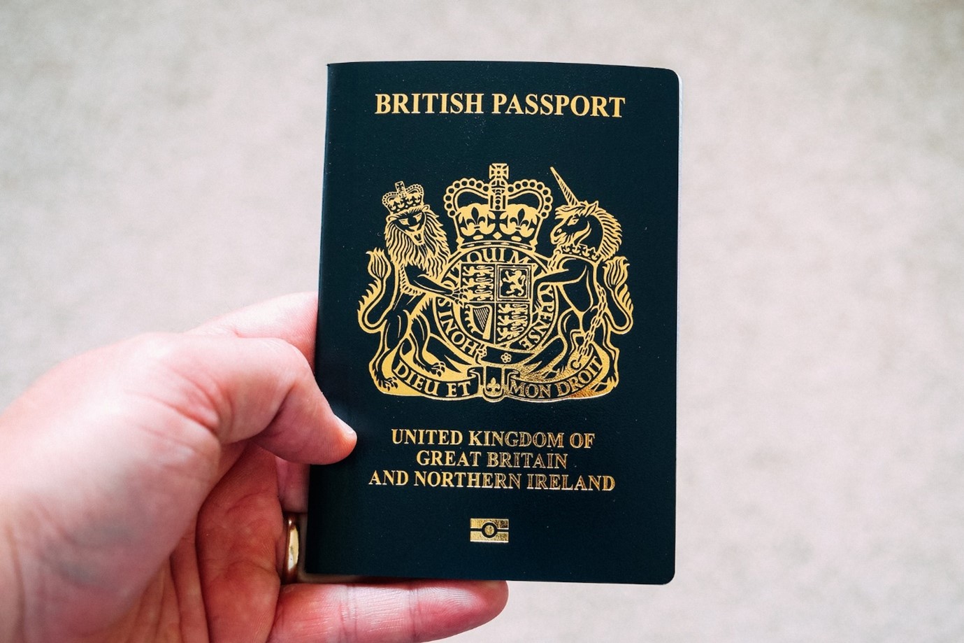 What should I do if my passport is lost or stolen while abroad?